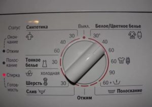 knoflík pro přepínání programů