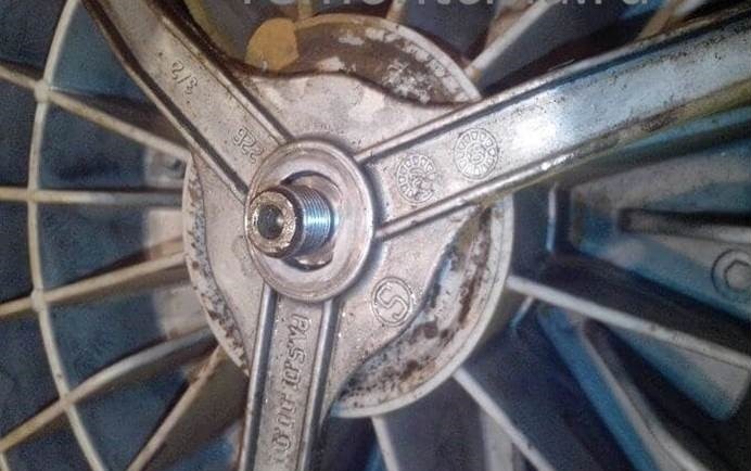 remove the pulley by unscrewing the screw 18