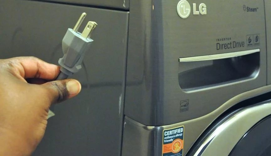 desconnecteu la rentadora de la xarxa elèctrica