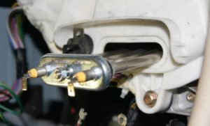 Saque el elemento calefactor y retire el objeto extraño a través del orificio.