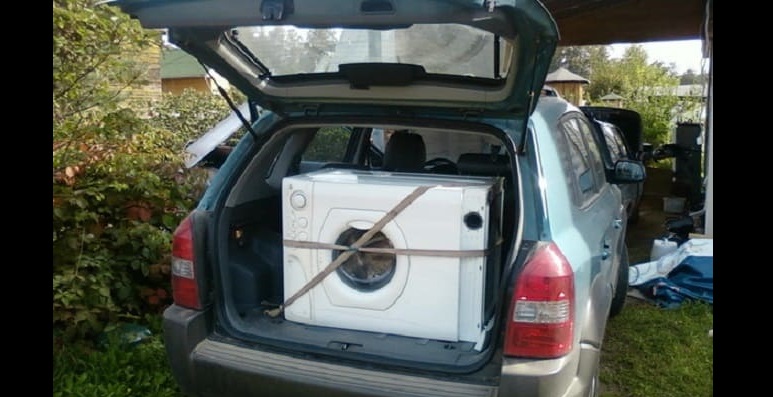 přeprava psacího stroje v osobním automobilu