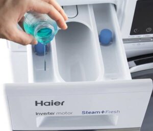 Kam naplnit kondicionér v pračce Haier